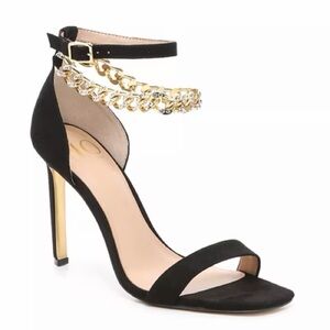 Jennifer Lopez Black Heels with Gold Chain Detail